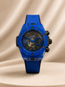 Blue luxury chronograph watch with skeleton dial and blue rubber strap