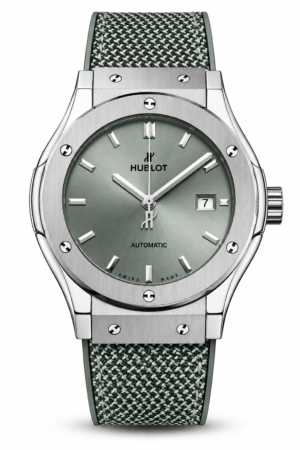 Silver Hublot-style automatic watch with grey woven strap and green-grey dial