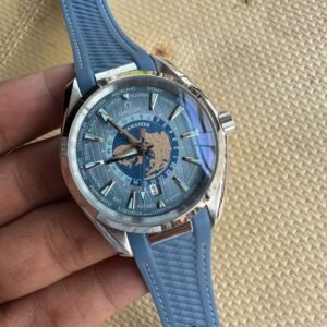 Blue dial silver dive watch with yellow markers and stainless steel mesh bracelet
